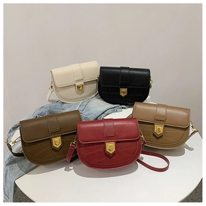 Chic saddle bags with crocodile texture and gold shield buckles in various colors