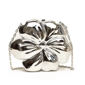 Elegant silver flower-shaped evening clutch bag with metallic mirror finish and chain strap