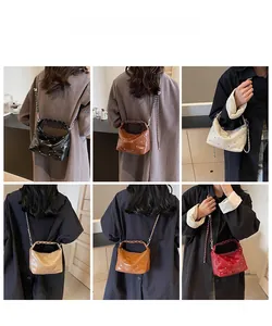 Multiple style showcase of quilted rivet chain bags in six colors for various carrying options