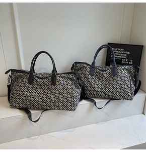 Detail of travel tote bags with geometric patterns and premium leather handles