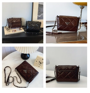 Detailed close-up of quilted pattern and triangular metal logo on luxury small chain bag
