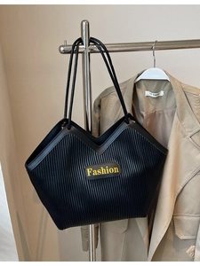Fashionable black large capacity tote bag with striped texture and long shoulder straps
