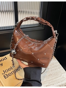 Brown oil wax leather chain bag with silver studs and diamond quilted texture