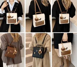 Fashionable PU leather backpack with cartoon dachshund pattern and plush charm detail