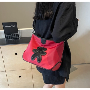 Sac de voyage rouge grande capacité avec ours en paillettes noires et sangle