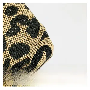 Detailed close-up showing the premium leopard print woven fabric of this large tote bag