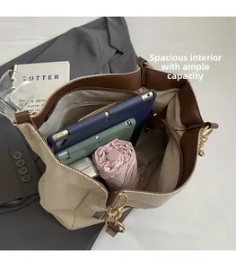 Interior view of beige canvas tote bag with large capacity for laptop and daily items