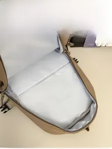 Internal capacity display of the spacious khaki outdoor backpack showing light lining