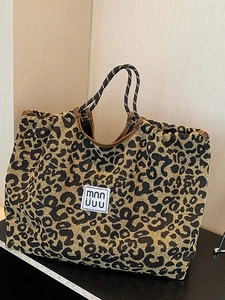 Retro leopard print canvas tote bag with brown leather trim and rope handles