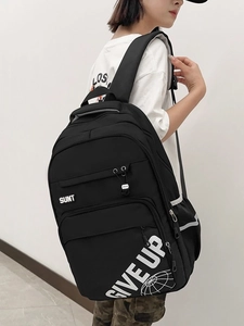 Black large capacity waterproof backpack with SUNT print and ergonomic straps for students