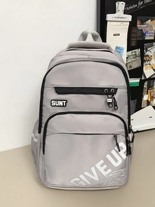 Gray large capacity multi-layered nylon backpack with SUNT label for students