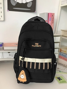 Grand sac à dos scolaire noir avec imprimé sourire et breloque pizza mignonne