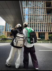 Close-up of trendy nylon backpacks with 'ARE SPECIAL' print and mini side pouches