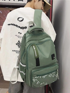 Minimalist green large capacity backpack with white geometric patterns for travel and school
