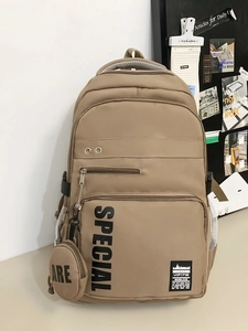 Large khaki school backpack with 'SPECIAL' print and a small matching round coin purse