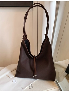 Large dark brown tote bag with knotted shoulder strap and silver bead drawstring closure