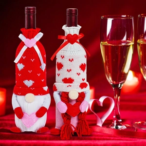 Valentine's Day faceless gnome wine bottle covers with heart knits and ribbons