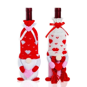 Valentine's Day gnome wine bottle covers with knitted heart patterns and long white beard