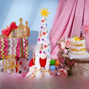 Detailed view of birthday gnome plush with Happy Birthday sign and festive party decor
