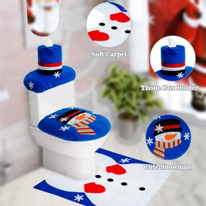 Detalle del juego de baño con muñeco de nieve, alfombra suave y funda de caja de pañuelos
