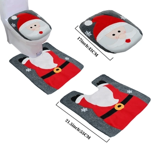 Detailed view of grey plush Christmas toilet seat cover and rug set with Santa Claus design