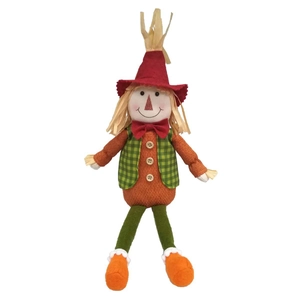 Detail of harvest scarecrow doll showing red hat, green plaid vest and rustic buttons