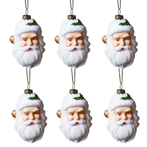 Detalle de 6 adornos de Papá Noel con acabado brillante y decoración de acebo