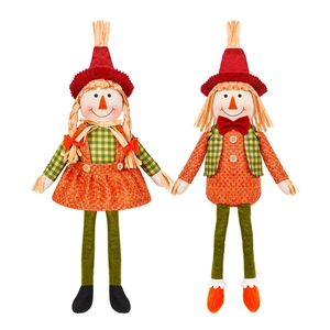 Sitting autumn scarecrow doll pair with orange hats and harvest plaid outfits