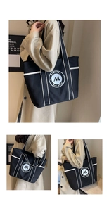 Vistas detalladas de un bolso tote de lona negra con costuras blancas y logotipo circular