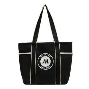 Bolso tote grande de lona negra con correas crema y logo vintage para la universidad