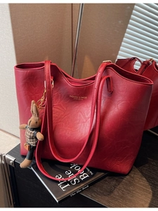 Large red faux leather tote bag with fashion lettering and cute rabbit pendant charm