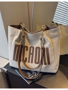 Large beige canvas tote bag with brown leather MICADI letters and chain strap