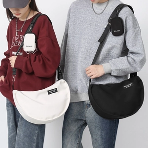 Large nylon crescent crossbody bag with adjustable wide strap and mini pouch