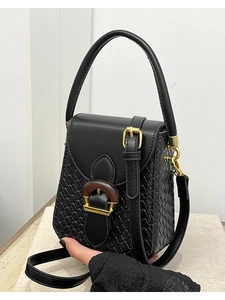 Chic black woven crossbody phone bag with vintage wood buckle and golden hardware