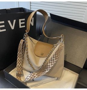 Detail of Korean style canvas tote bag with brown leather handles in premium gift box set