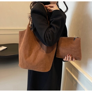Brown PU suede tote bag and matching clutch set shown on model for daily casual style
