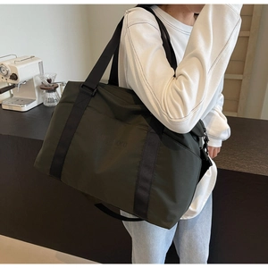 Olive green travel bag showing capacity and style in a modern lifestyle setting