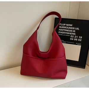Minimalist deep red PU leather tote bag with lychee texture and wide shoulder strap