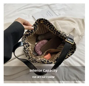 Internal capacity of leopard print canvas tote bag with magnetic closure and inner pockets