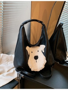 Chic black faux leather dog-themed tote bag with white plush embroidery and top handle