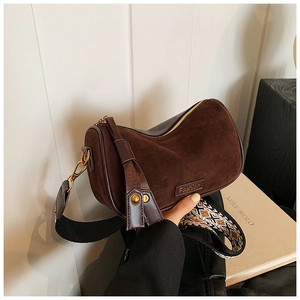 Brown suede Boston bag with ethnic wide strap and fashion metal logo detail