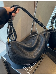 Retro black lychee grain crescent hobo bag with knot shoulder strap details