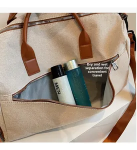 Detail of dry-wet separation compartment on beige canvas bag with leather trim
