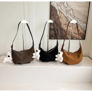 Detailed comparison of brown, black and caramel matte hobo bags with cute plush charms