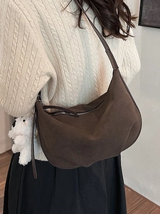 Brown matte retro hobo crossbody bag for women with a cute white puppy pendant