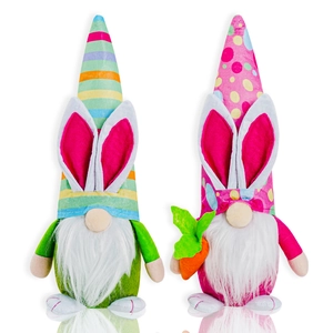 Detail of Easter gnome set with rabbit ears, striped hats and holding a plush carrot