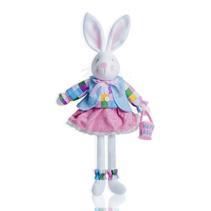 Detail of plush Easter bunny doll wearing plaid shirt and lace skirt holding a bucket