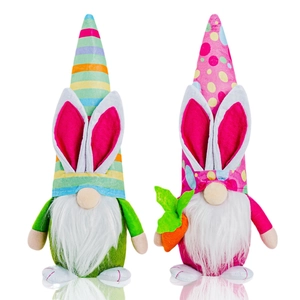 Set of two colorful Easter Gnomes with rabbit ears, carrot, and striped pointed hats