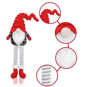 Detail of plush gnome showing textured red hat, knitted nose and striped long legs