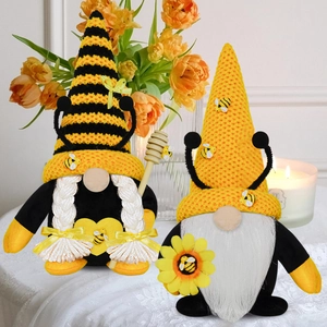 Bee festival gnome plush set with sunflower and heart decorations on lace tablecloth